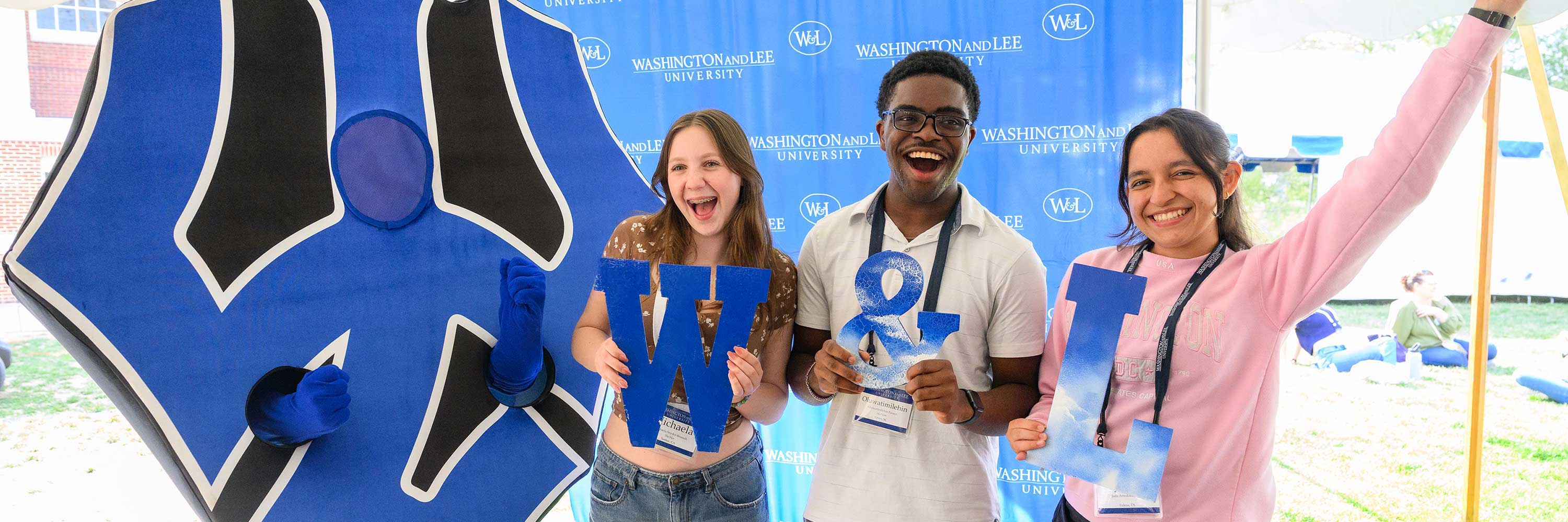Three students pose for a photo on Admitted Students Day